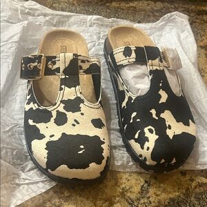 Steve Madden Women’s Black & White Cow Print Slip-On Mule